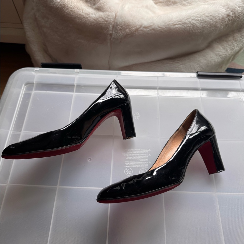 Classic Christian Louboutin patent leather pumps